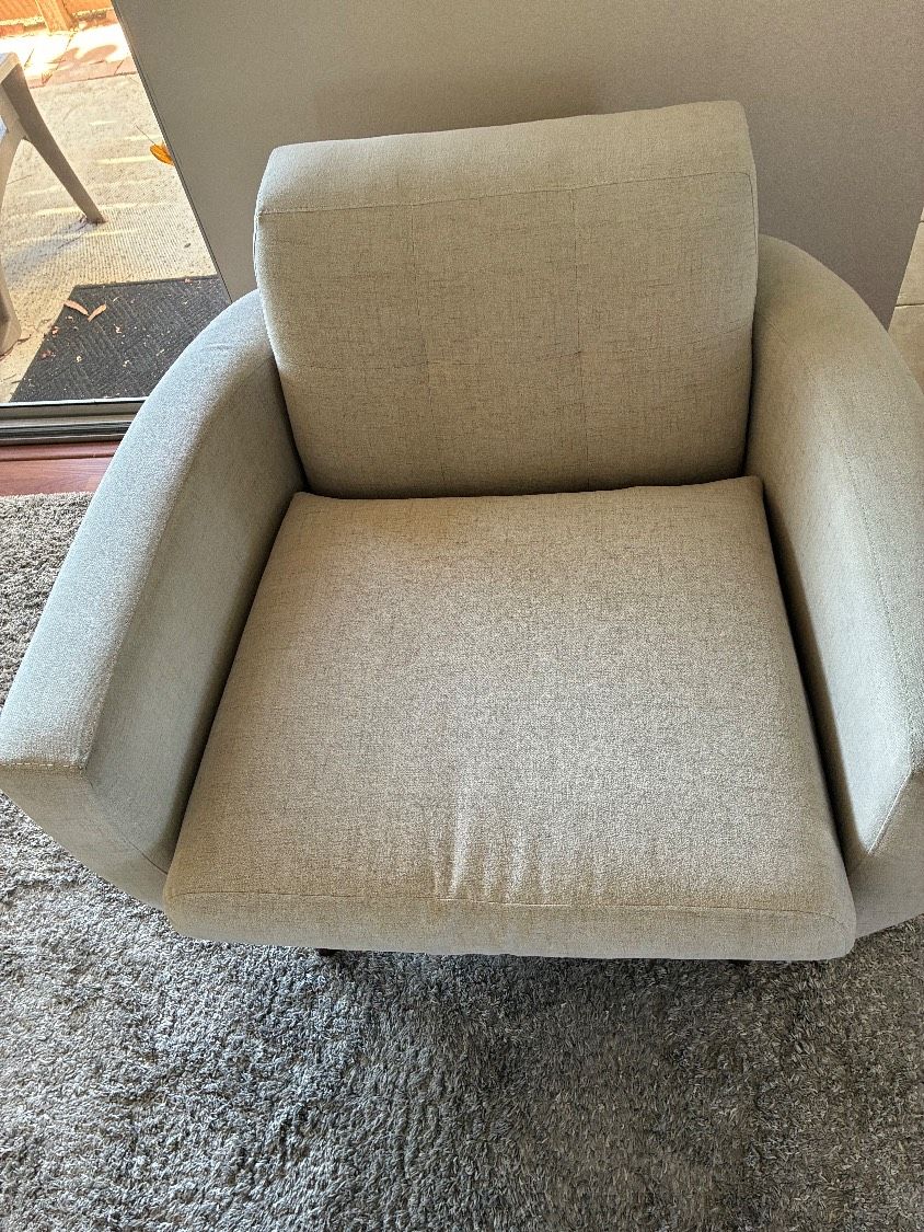 The same swivel accent chair in San Marcos with the soiling and stains removed after cleaning
