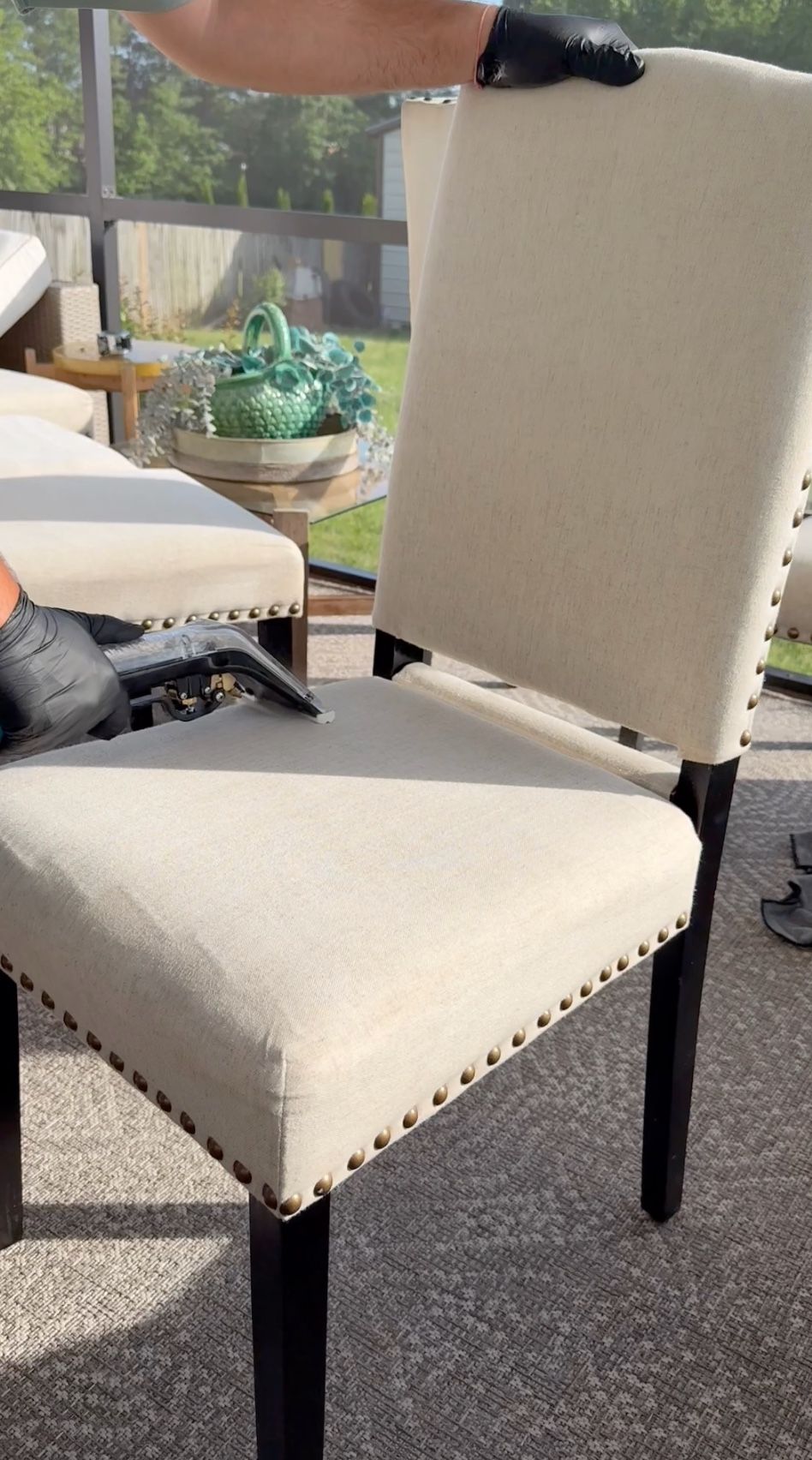 Upholstery cleaning tool being used on a dining chair during an on-site furniture cleaning appointment in Scripps Ranch